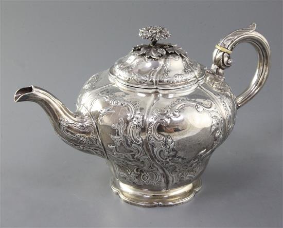 A Victorian silver teapot, gross 24 oz.
